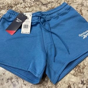 NWT Baby Blue Women’s Reebok Identity French Terry Jogger Shorts Size XS.